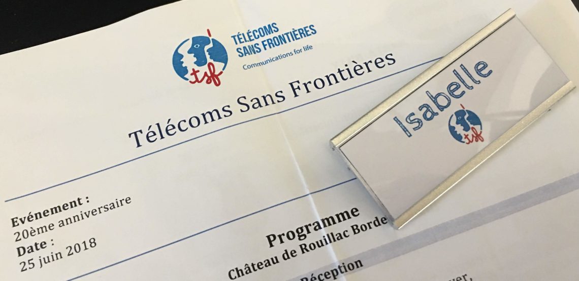Télécoms Sans Frontières - programme and badge for the 20th anniversary